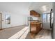 Open-concept living room flows into the kitchen, perfect for entertaining at 8701 Huron St # 5-210, Thornton, CO 80260