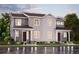 Charming two-story home with gray siding, manicured lawn, and inviting front entrance, creating a welcoming curb appeal at 14105 Deertrack Ln, Parker, CO 80134