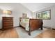Charming bedroom with hardwood floors, wood trim window and vaulted ceilings at 2386 Daisy Ln, Golden, CO 80401