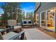 Relaxing deck with comfortable seating, perfect for enjoying the outdoors and scenic views at 2386 Daisy Ln, Golden, CO 80401