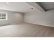 Finished basement featuring neutral paint, carpet, and a window providing natural light at 20125 Indi Dr, Monument, CO 80132