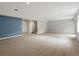 Finished basement with neutral carpet, recessed lighting, and painted accent wall for a bright and open space at 20125 Indi Dr, Monument, CO 80132
