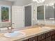 Bathroom with double sinks, tile countertops, dark cabinets, and large mirror at 20125 Indi Dr, Monument, CO 80132