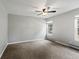Bedroom featuring new carpet, neutral paint, ceiling fan and natural light at 20125 Indi Dr, Monument, CO 80132