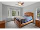 Cozy bedroom with a bay window providing lots of natural light and views of nature at 20125 Indi Dr, Monument, CO 80132