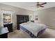 Bright bedroom with carpet, a large bed, and natural light at 20125 Indi Dr, Monument, CO 80132