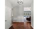 Inviting home entryway showcasing wood floors and a glimpse into the cozy living space at 20125 Indi Dr, Monument, CO 80132