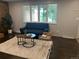 Inviting living room with stylish furniture, hardwood floors, and large windows at 1088 Douglas Dr, Denver, CO 80221