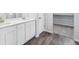 Stylish bathroom featuring double sinks, sleek cabinets, and tile flooring, creating a spa-like retreat at 9996 Racine St, Commerce City, CO 80022