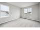 Inviting bedroom with soft carpet, ample natural light, and a serene atmosphere at 9996 Racine St, Commerce City, CO 80022
