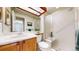 Well-maintained bathroom with a shower stall and a large mirror over the sink at 2897 W Riverwalk Cir # 204, Littleton, CO 80123