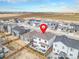 Aerial view showcases the home's prime location, surrounded by well-maintained landscaping in a friendly neighborhood at 1408 Brookfield Pl, Lafayette, CO 80026