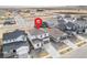 Aerial view of home in a neighborhood with well-maintained lawns, mature trees, and convenient access to local amenities at 1408 Brookfield Pl, Lafayette, CO 80026