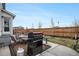Spacious backyard features a seating area, and a well-maintained fence at 1408 Brookfield Pl, Lafayette, CO 80026