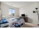 Bright bedroom features a comfortable bed, and a great view at 1408 Brookfield Pl, Lafayette, CO 80026