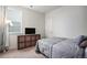 Neutral bedroom with accent colors, and a side storage unit at 1408 Brookfield Pl, Lafayette, CO 80026