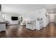 Spacious living room with hardwood floors and plenty of natural light at 1408 Brookfield Pl, Lafayette, CO 80026