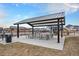 Community pavilion with picnic tables, seating, and a grill for outdoor gatherings and events at 1408 Brookfield Pl, Lafayette, CO 80026