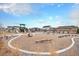 Community playground with modern play equipment and ample space for children to enjoy at 1408 Brookfield Pl, Lafayette, CO 80026