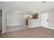 Bright kitchen featuring white cabinets, stainless steel appliances, and tile flooring at 18071 E Kentucky Ave # 203, Aurora, CO 80017