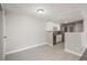 Well-lit kitchen area with stainless steel appliances and white cabinetry at 18071 E Kentucky Ave # 203, Aurora, CO 80017