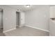 Open kitchen space with tile flooring and potential dining area at 18071 E Kentucky Ave # 203, Aurora, CO 80017