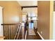 Open-concept hallway leading into a cozy Gathering living space at 2305 Dogwood Cir, Erie, CO 80516