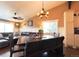 Open-concept area with dining space to the right and living space to the left at 2305 Dogwood Cir, Erie, CO 80516
