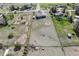 Aerial view showcasing the property's expansive acreage, complete with a house and outdoor features at 36901 View Ridge Dr, Elizabeth, CO 80107