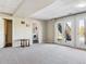Finished basement offering ample space with carpet, laundry area, and natural light at 36901 View Ridge Dr, Elizabeth, CO 80107