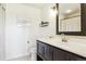 Well-lit bathroom with a sleek vanity, modern fixtures, and a minimalist design provides a spa-like experience at 36901 View Ridge Dr, Elizabeth, CO 80107