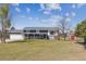 Charming two-story home with a covered front porch, spacious yard, and mature trees, perfect for serene country living at 36901 View Ridge Dr, Elizabeth, CO 80107