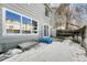 The backyard patio with access to the home provides a great outdoor living space at 15925 E 13Th Ave, Aurora, CO 80011