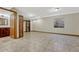 This basement has a full bathroom, a closet, recessed lighting, and neutral tile flooring at 15925 E 13Th Ave, Aurora, CO 80011