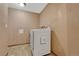 This laundry room is equipped with a washer and dryer and features tile flooring at 15925 E 13Th Ave, Aurora, CO 80011