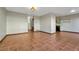 Spacious living room features tile floors, a wet bar, neutral paint and ample space at 15925 E 13Th Ave, Aurora, CO 80011