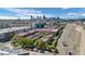 Overhead perspective of contemporary condominiums blends seamlessly with a vibrant urban landscape and distant mountain vistas at 3295 Blake St # 301, Denver, CO 80205