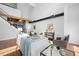 Spacious living area with soaring ceilings, hardwood floors, and staircase creates an open and inviting atmosphere at 3295 Blake St # 301, Denver, CO 80205