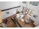 A bird's eye view of the living room and dining room showing open-concept design with plenty of light at 3295 Blake St # 301, Denver, CO 80205