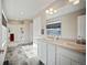 Elegant bathroom with double vanity and walk-in shower at 27129 E Cedar Ave, Aurora, CO 80018