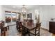 Elegant dining room featuring a large table and access to backyard at 2805 E 4Th Ave, Denver, CO 80206