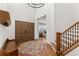 Spacious entryway with hardwood floors and a view to the living room at 2805 E 4Th Ave, Denver, CO 80206