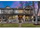 Stunning two-story home with a charming facade and manicured lawn at 2805 E 4Th Ave, Denver, CO 80206