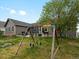 Backyard features swing set, patio, and backyard kitchen at 5708 Wetland Loop, Frederick, CO 80504