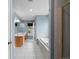 Bright bathroom with a double vanity, soaking tub, and a tiled shower at 5708 Wetland Loop, Frederick, CO 80504