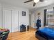 Cozy bedroom with hardwood flooring, closet and natural light at 5708 Wetland Loop, Frederick, CO 80504