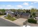 Charming single-story home featuring stone and siding accents, a two-car garage, and a well-maintained front yard at 5708 Wetland Loop, Frederick, CO 80504