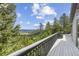 Wide balcony featuring expansive mountain views and lush greenery, great for relaxing at 6882 Snowshoe Trl, Evergreen, CO 80439
