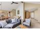 Inviting living room featuring modern decor, comfortable seating, and an open layout at 6882 Snowshoe Trl, Evergreen, CO 80439