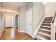 Home entryway with hardwood floors and staircase at 2553 S Troy Ct, Aurora, CO 80014